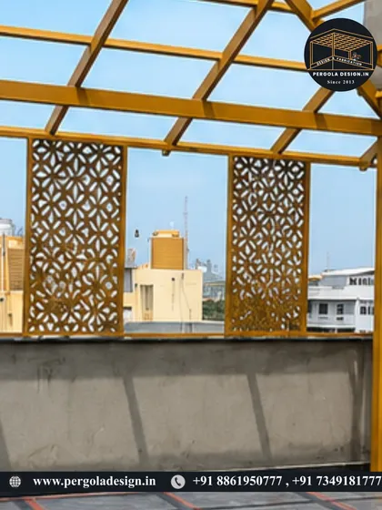 A detail shot of the decorative CNC panels on the yellow pergola, adding a touch of elegance and privacy to the structure.