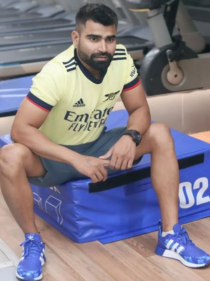 This is my post-workout look, sitting on a plyo box in my favorite team's jersey. It's about finding a balance between hard work and enjoying the things you love.
