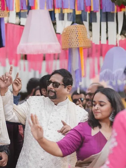 The groom's Baraat making its way through the scenic hills of Wayanad. We arranged for a vintage car and vibrant decor to make the procession a lively and picturesque affair.