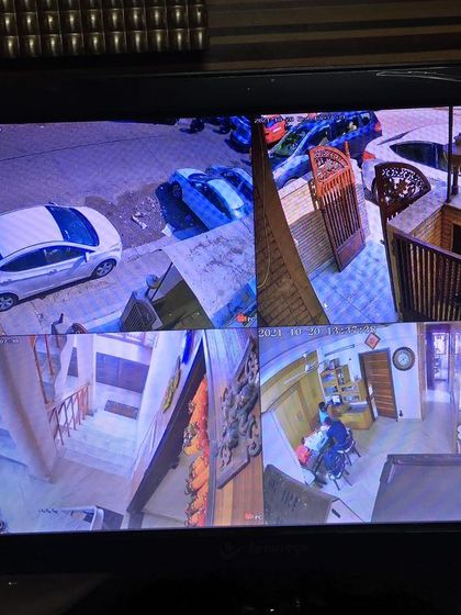 Another example of a 4-camera home monitoring system, covering the car parking area and entrance.
