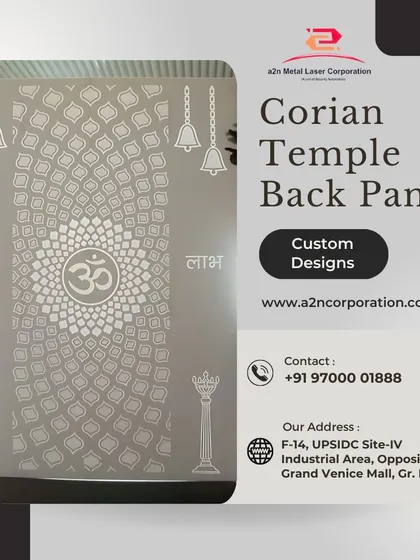 A custom Corian temple back panel featuring an engraved "Om" symbol within a decorative pattern. The design also includes traditional motifs like bells and pillars, demonstrating how we can customize panels to create a unique spiritual centerpiece.