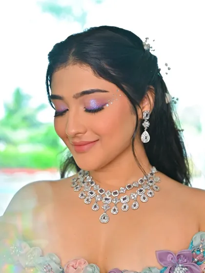 A close-up on the sparkling purple eyeshadow. This is a great example of how to wear color in a way that is both bold and beautiful.