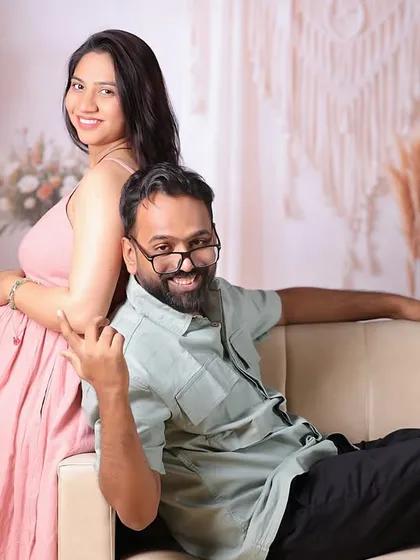 Another playful pose from the same maternity session, showing the happy anticipation of the parents-to-be.