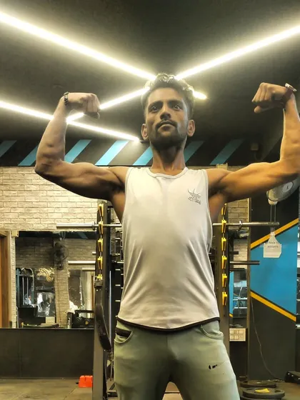 Flexing in the gym. I believe that being proud of your hard-earned results is a great motivator to keep going.