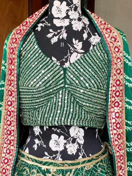 The lehenga comes with a matching potli bag and beautiful tassels, because details matter.