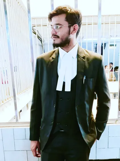 A candid shot in my lawyer's attire. I am focused and ready for the responsibilities that come with being a criminal defense advocate.