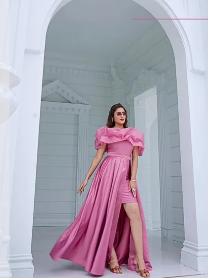 A "New Collection" graphic featuring the stunning pink high-low gown.