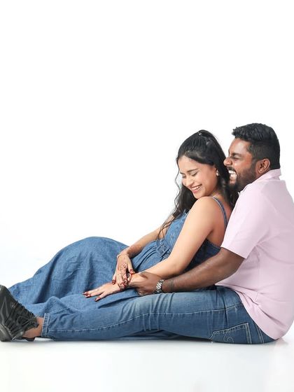 Laughter and love. This candid shot on a clean white background captures the pure joy and fun of being together on this exciting journey.