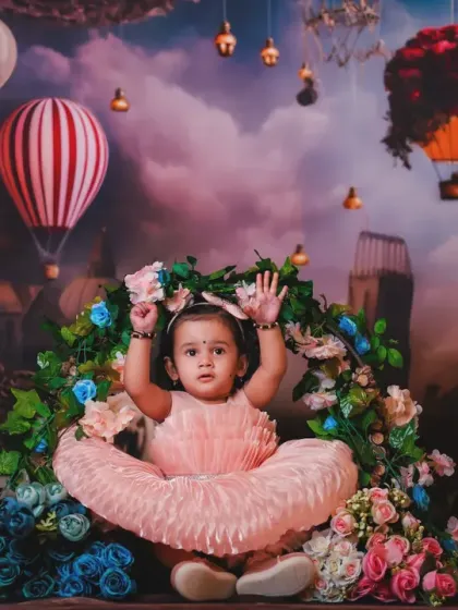 A beautiful baby surrounded by a floral ring in our fantasy world. This shot combines two beautiful elements into one magical photo.