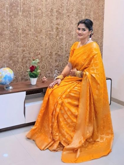 A full-length shot of the client, seated and looking graceful.