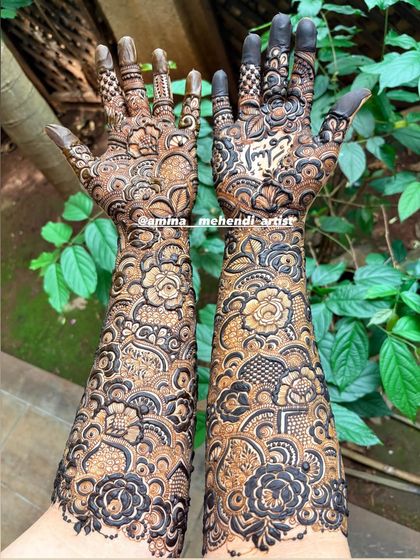 This design, set against a natural backdrop, showcases the intricate floral and paisley patterns that are central to my style.