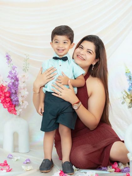 A mother's love captured in a sweet moment with her son. Our studio provides a comfortable space for these natural and affectionate portraits.
