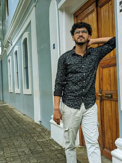 A traveler posing in the French Quarter of Pondicherry. Our trips are designed to create beautiful moments and perfect photo opportunities.