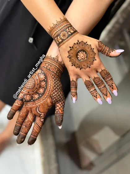Showcasing my versatility with a modern mix-and-match style. One hand features a delicate lotus mandala, while the other is adorned with a fuller, more traditional pattern.