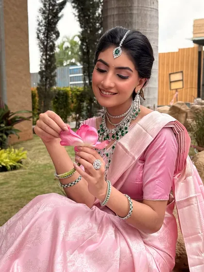 Another angle of this dreamy look, showcasing the perfect blend of the makeup with the stunning diamond and emerald jewellery.