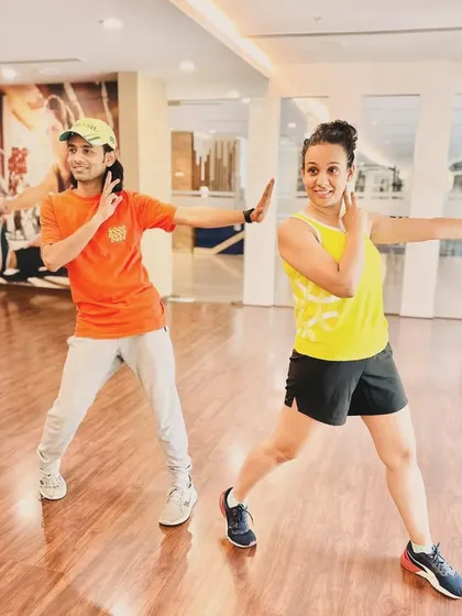 There are shortcuts to happiness, and dancing is one of them! A happy moment captured with a client during a practice session. Building this connection and seeing you smile is the best part of my job.