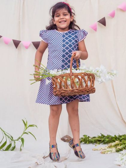 Jumping for joy in this stylish and comfortable printed dress. The cap sleeves and easy silhouette make it a great choice for an active day.