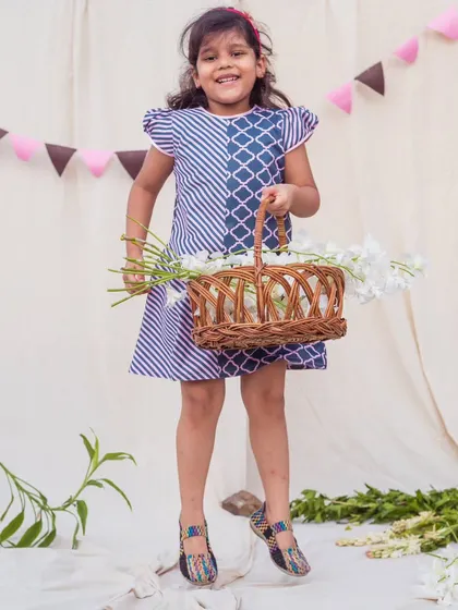 Jumping for joy in this stylish and comfortable printed dress. The cap sleeves and easy silhouette make it a great choice for an active day.