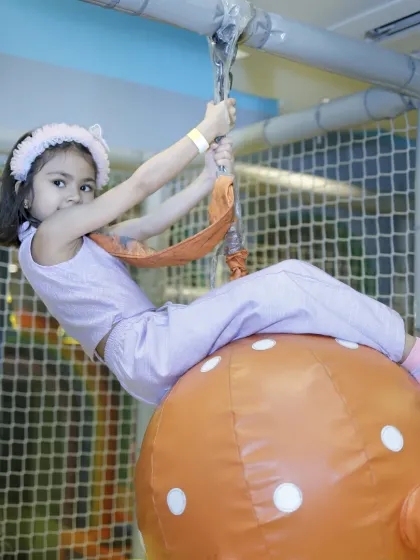 This octopus-themed swing adds a whimsical touch to our obstacle course area.