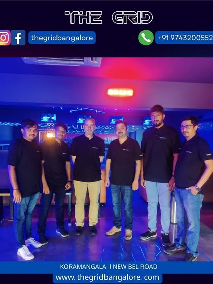 A corporate team posing for a photo at our venue.