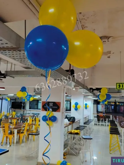 We also provide simple balloon decorations for corporate events or office spaces. These large, 3-foot helium balloons in blue and yellow add a pop of color and can be customized to match your company's branding.