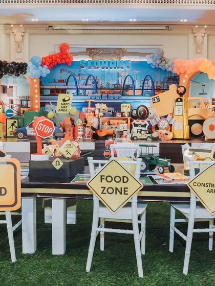 The 'Food Zone' and 'Construction Area' at Sidhant's party. I use themed signage to make every part of the event, including the dining area, feel fun and immersive.