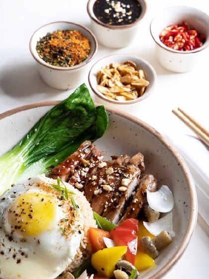 Our Teriyaki Bowl is a must-try, complete with all the authentic condiments like togarashi, fried garlic, and chili.