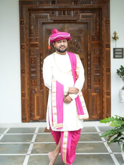 The perfect pose in the perfect wedding outfit. Renting a sherwani like this ensures you look your best on your special day without the high cost of buying.