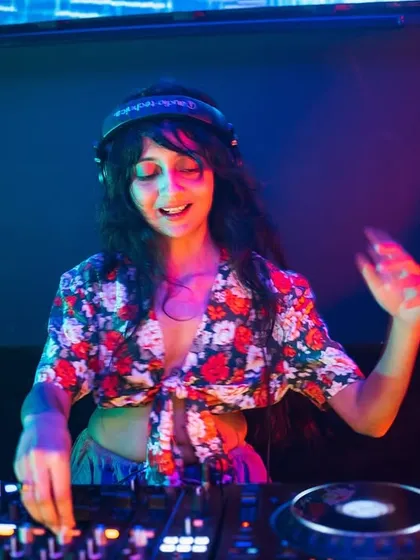 The colorful lights of the club reflecting as I mix. The visual spectacle of a club night is part of what makes it so exciting.