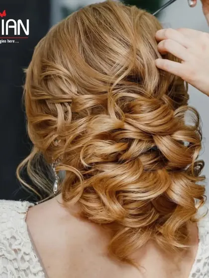 A classic hair updo for a wedding or special event. We create intricate and secure hairstyles, from elegant curls to sophisticated buns, that are designed to last all day.