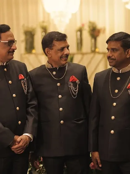 For a special family wedding, the Jain brothers wanted coordinated yet personalized outfits. We designed these matching black bandhgala suits, each tailored to the individual's preference while maintaining a unified, elegant look.