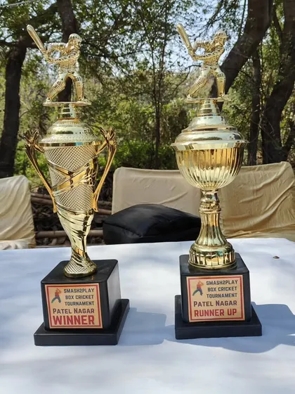 The spoils of victory. The winner and runner up trophies for the Patel Nagar box cricket tournament, ready for the top two teams.