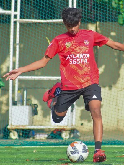 A player from our U15 squad striking the ball with power and precision during an MBPL match.