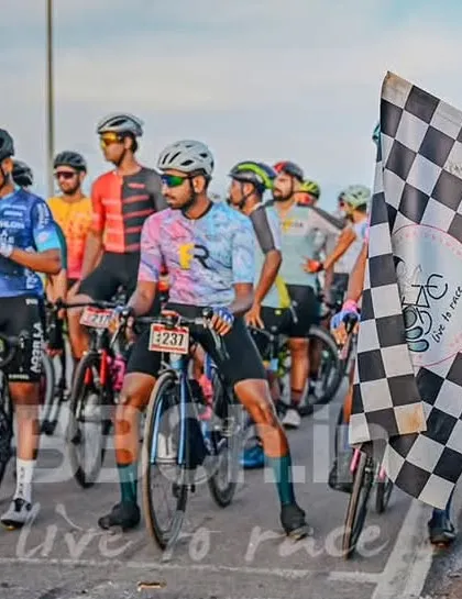 The chequered flag signals the start of the race, a moment filled with adrenaline and anticipation.