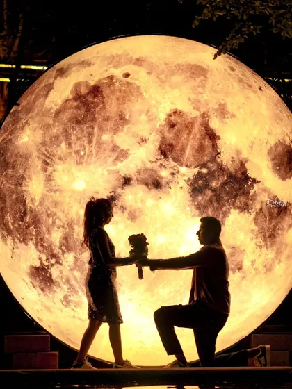 A perfect silhouette against a giant moon prop. This is one of the many creative setups I offer in my all-in-one pre-wedding packages, which include location, props, and costumes.