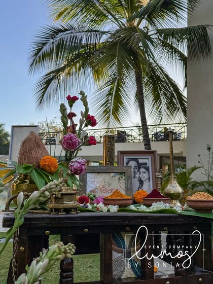 A beautiful arrangement of traditional Hindu wedding elements like kumkum, turmeric, and flowers, symbolizing purity and blessings.