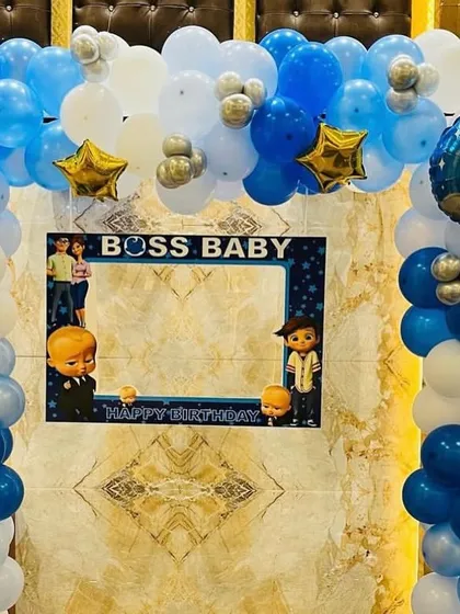 A fun photo booth frame for a Boss Baby party. This is a great way for guests to take memorable pictures and be a part of the theme.