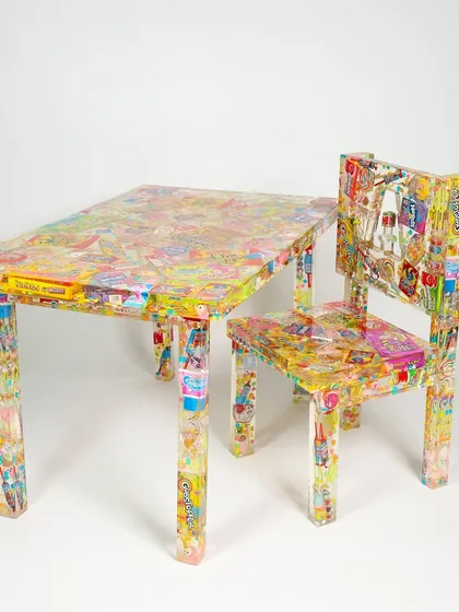 A full view of the 'I Spy' table and chair set, filled with colorful candies and treats. Each piece is a time capsule, locking in the nostalgia of childhood one resin layer at a time.