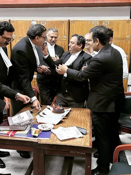 A candid moment of celebration and camaraderie for a fellow criminal law advocate.