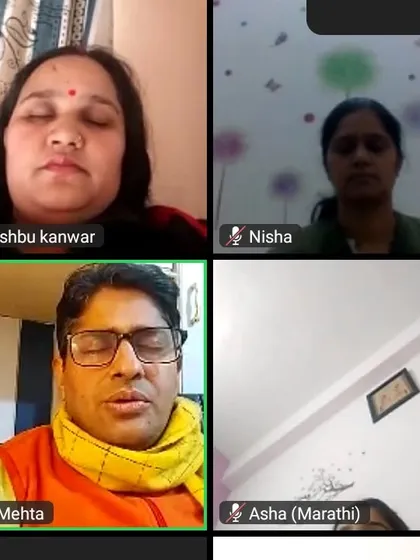 Participants listening intently during an online theory session. My workshops are not just about physical practice; they are deeply educational, covering the philosophy and science behind yoga.