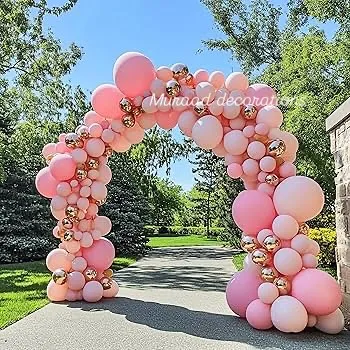 This grand balloon arch was created for an outdoor baby shower. The mix of pastel pink and rose gold balloons creates a soft and celebratory entrance, showing how we can make large open spaces feel festive and welcoming.