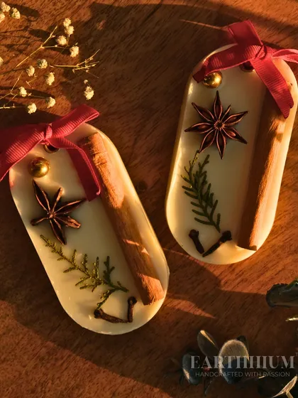 For a flameless fragrance option, I create these natural wax sachets. This one is made with real cinnamon sticks, star anise, and fir sprigs embedded in scented soy wax. You can hang it in a closet or place it in a drawer to gently perfume your space.