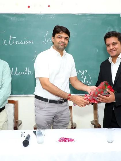 Receiving a token of appreciation from the faculty at Jai Narayan Vyas University after my session with the students.