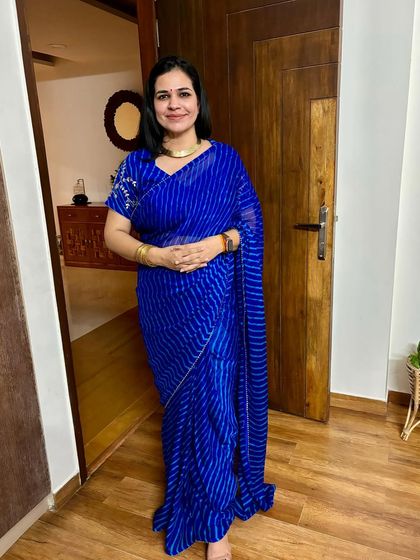My best saree looks from January to December. This royal blue leheriya saree is a classic that I love for its vibrant color and traditional pattern.
