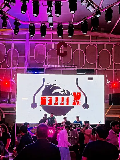 A wide view from a packed weekend gig. The right combination of sound, lighting, and visuals is key to creating an immersive experience, and I work with venues to make sure the production is top-notch.