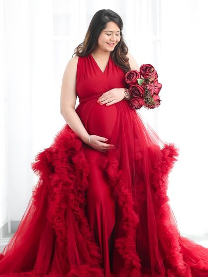 A series of solo portraits showcasing the vibrant and dramatic red gown from my client closet, styled in different ways from regal to romantic.