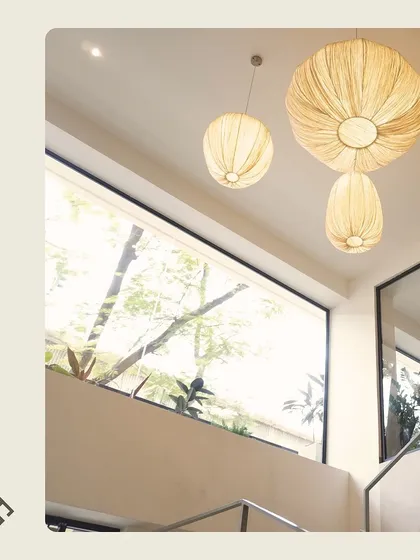 A close-up of the large windows and high ceilings that make our spaces feel so open and full of light.