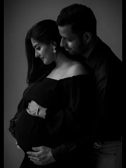 This intimate close-up in black and white highlights the gentle expressions and connection between the couple. It’s a beautiful example of how this style can make a photo feel incredibly personal and emotional.