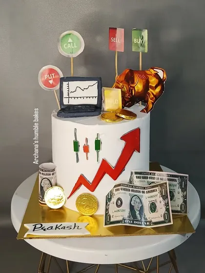 For the finance enthusiast, this stock market themed cake was a big hit. It features edible money, bull and bear market symbols, and stock charts, showing that any passion can be turned into a delicious, custom cake design.