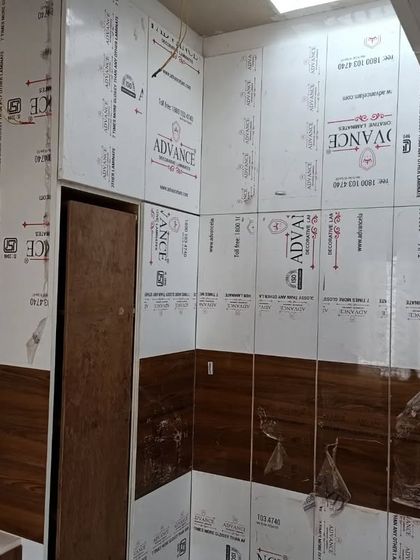 The kitchen area of an outstation project, with protective sheets still on the modular cabinets. This shows how we ensure materials are kept in perfect condition during installation.